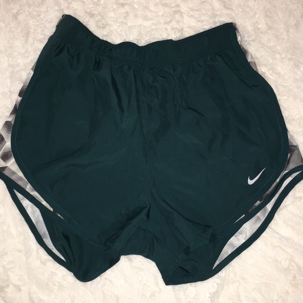Green NIKE athletic shorts